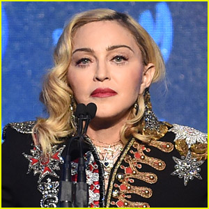 Madonna Goes Topless & Poses with Her Crutch - See Photo!